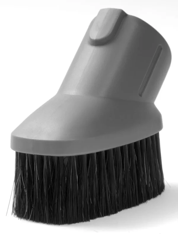 A close up of the brush on top of a vacuum cleaner