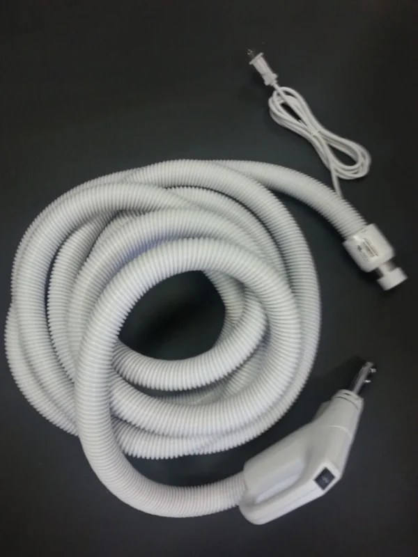 A white hose with a white handle and a black background