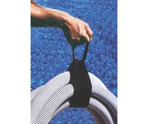 A person holding onto the end of a hose