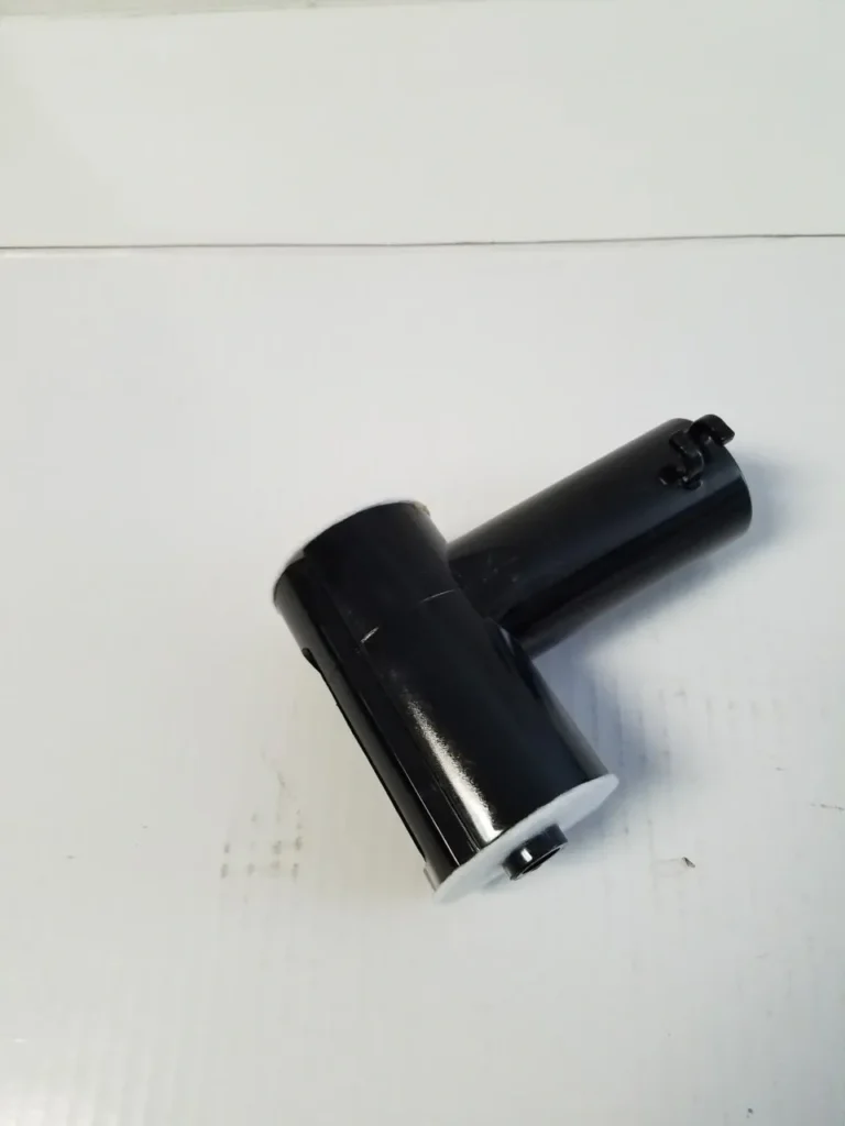 A black and white picture of an object on the floor.