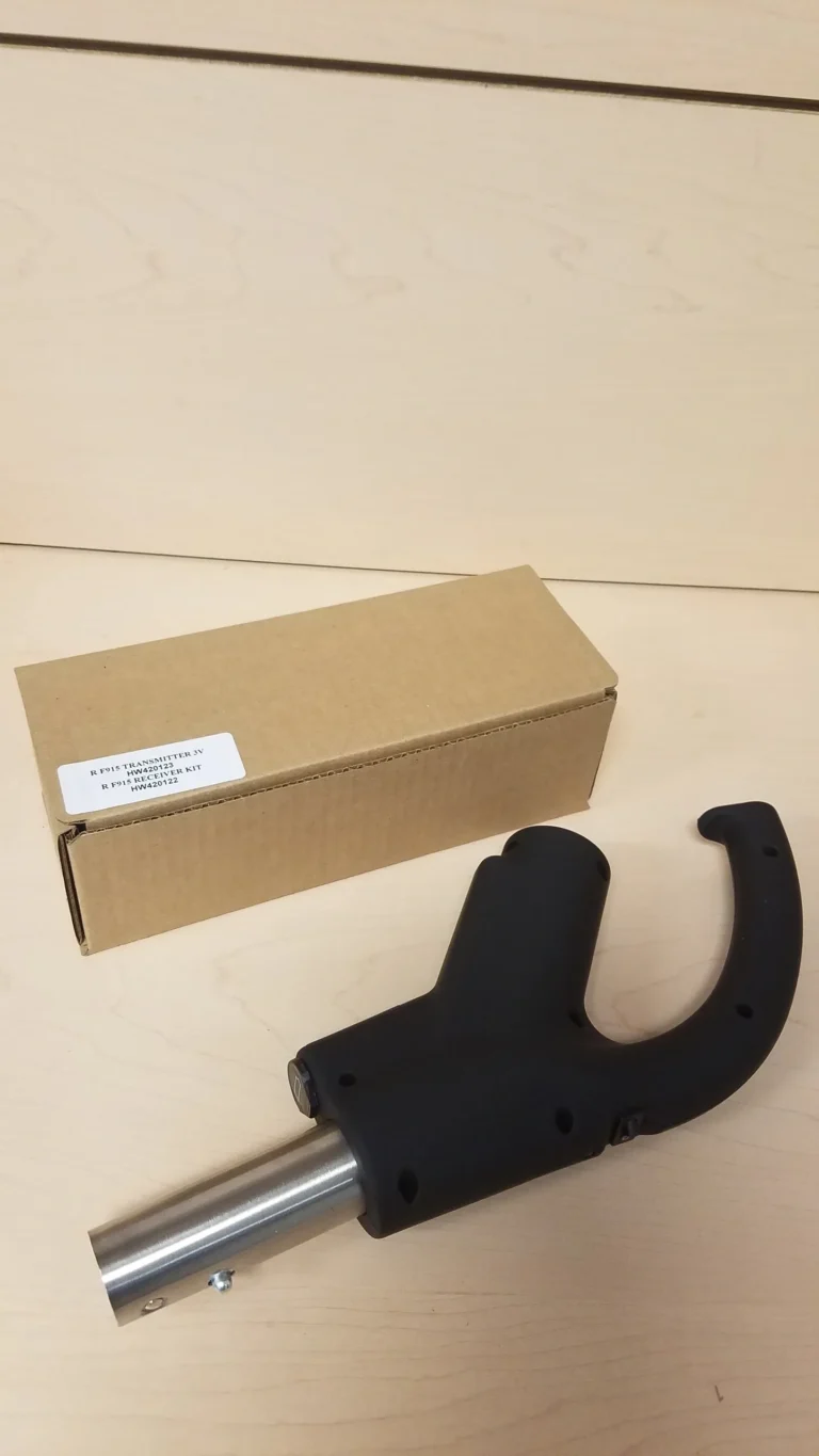 A box and a black object in front of it.