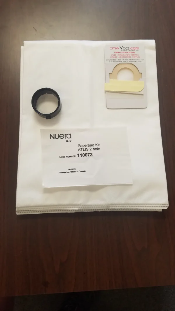 A paper bag with some papers and a ring