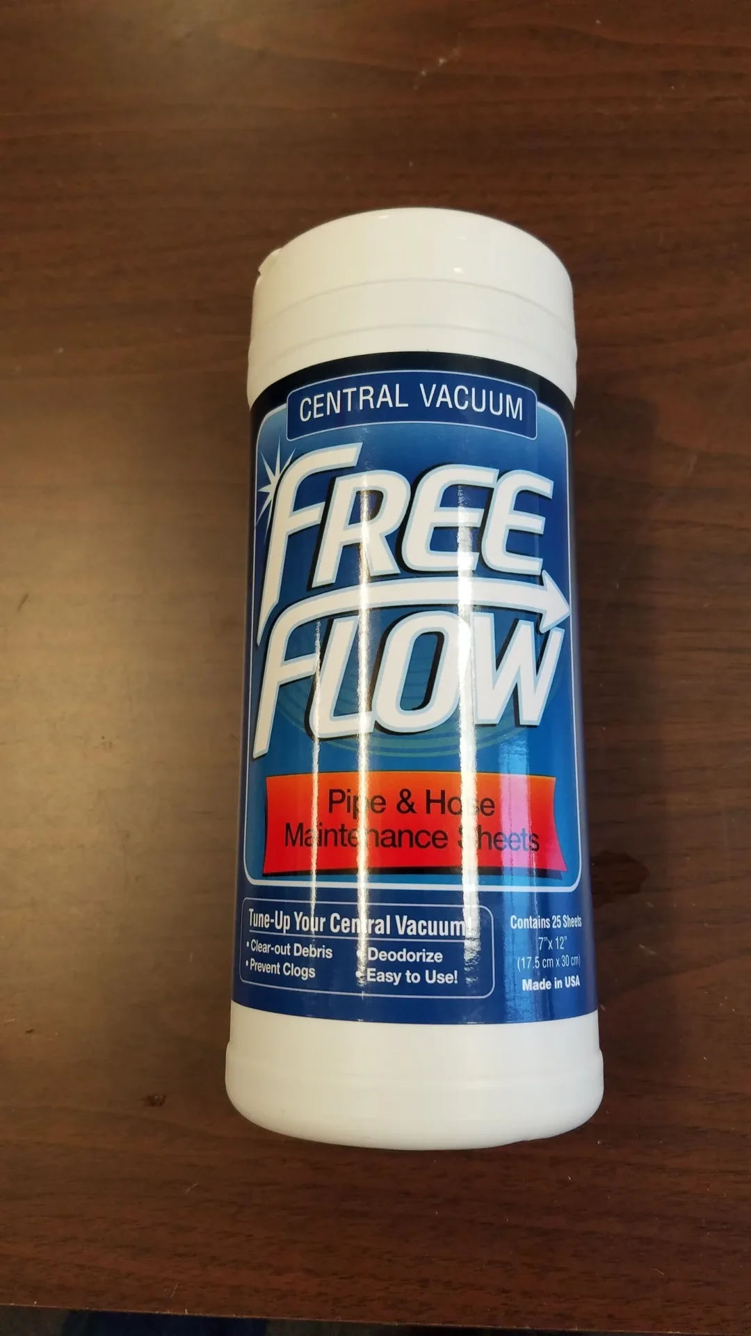 A tube of free flow is sitting on the table.