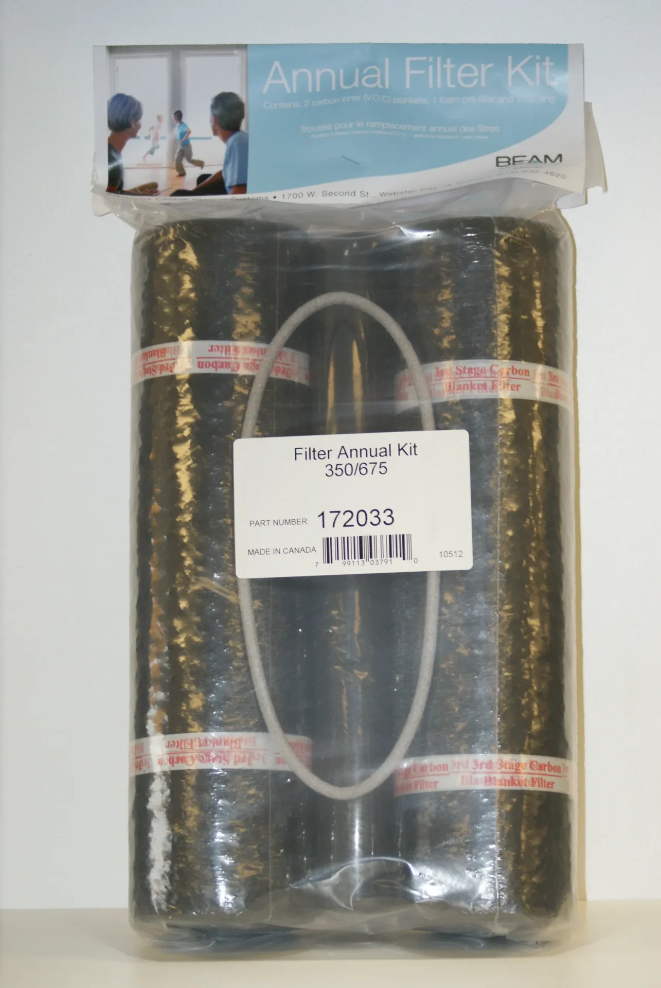 A tube of filter material is shown in its packaging.