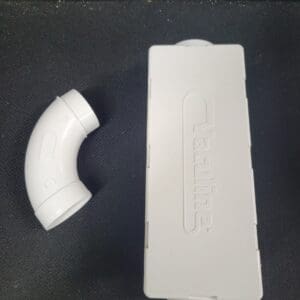 White PVC conduit junction box and elbow